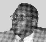 Dr Kaire Mbuende